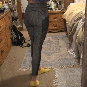 Black patterned lulu lemon leggings with mesh side
